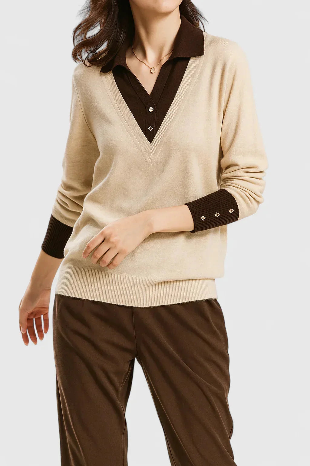 Women's knit v-neck sweater with button detail on cuffs