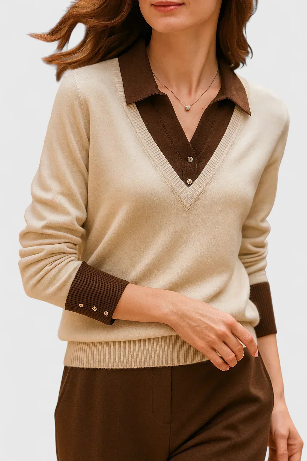 Women's knit v-neck sweater with button detail on cuffs