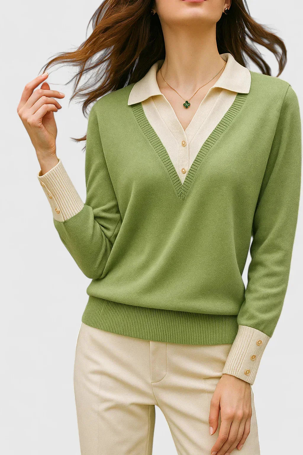 Women's knit v-neck sweater with button detail on cuffs