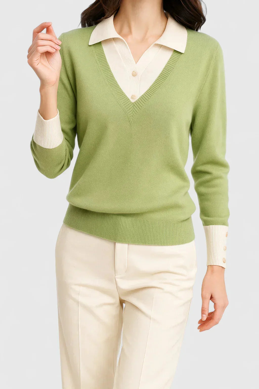 Women's knit v-neck sweater with button detail on cuffs