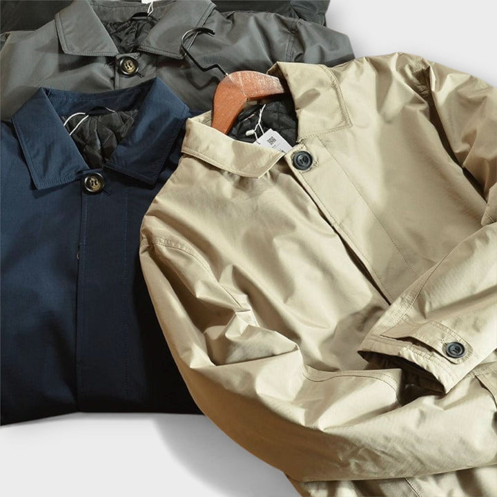 Mid-length men's coat with front button placket and classic turn-down collar