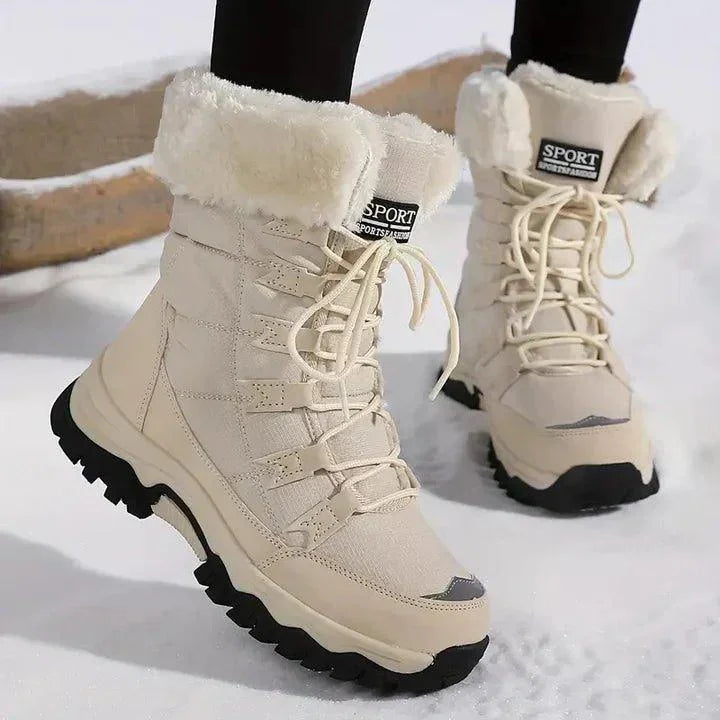 Women's warm waterproof fur-lined winter boots with lace-up quilted design