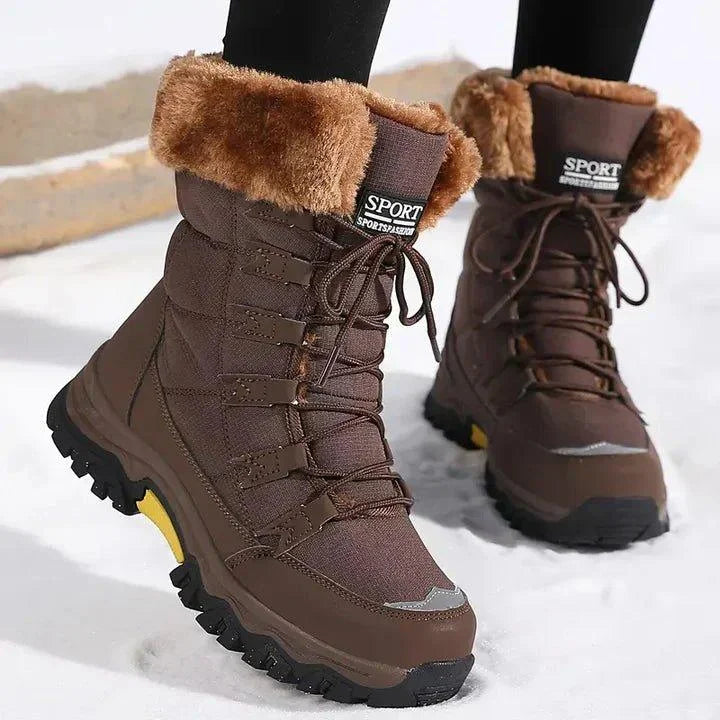 Women's warm waterproof fur-lined winter boots with lace-up quilted design